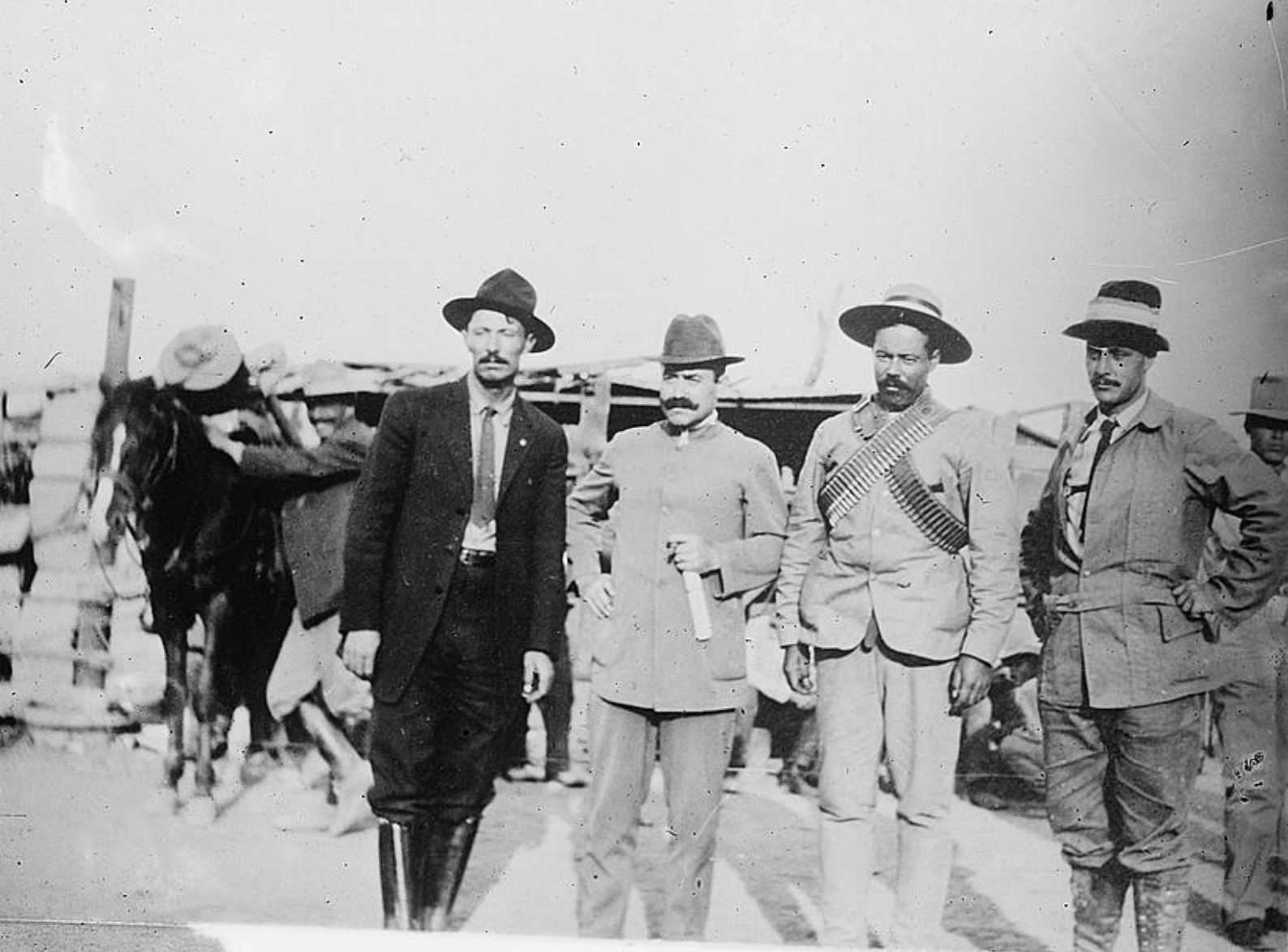 General Pascual Orozco and Colonels Oscar Braniff, Pancho Villa and Peppino Garibaldi, photographed after taking Juárez City, during the Mexican Revolution. 